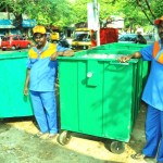 Platforms and metal containers for garbage bins