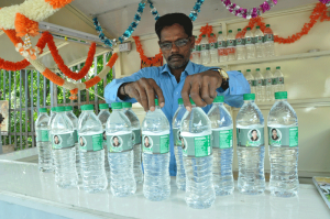 AMMA WATER BOTTLE SALES  AT MYLAPORE TANK ,EACH 10 RUPEES. ON 19-9-13 